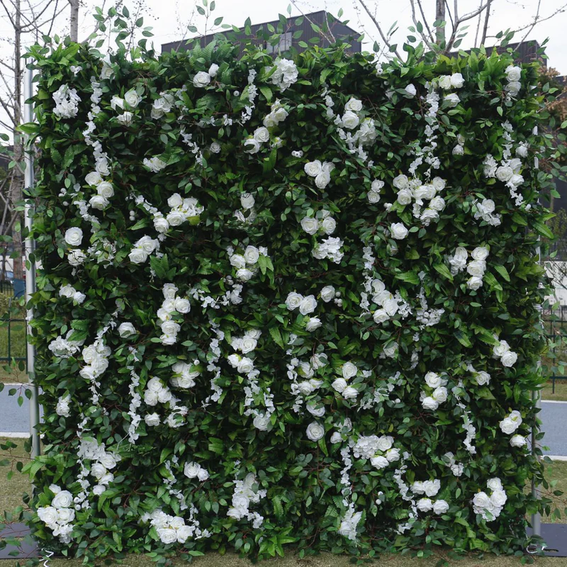 Tessuto artificiale verde del muro di fiori rotolando lo sfondo floreale per la festa